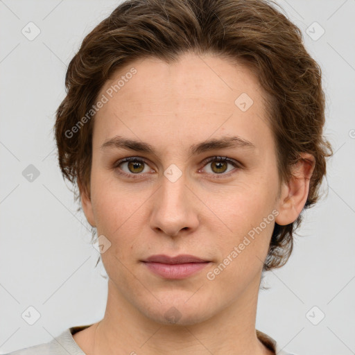 Joyful white young-adult female with medium  brown hair and green eyes