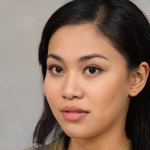 Neutral asian young-adult female with long  brown hair and brown eyes