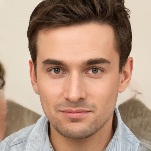 Neutral white young-adult male with short  brown hair and brown eyes