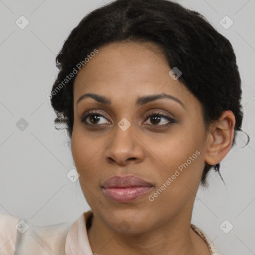 Joyful black young-adult female with medium  black hair and brown eyes