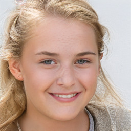 Joyful white young-adult female with long  brown hair and blue eyes