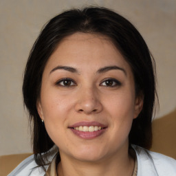 Joyful white young-adult female with medium  brown hair and brown eyes