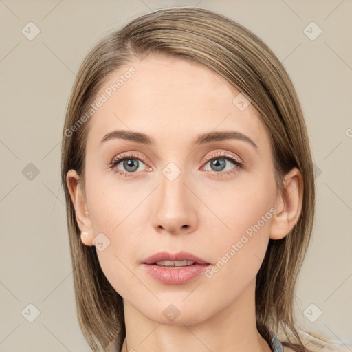 Neutral white young-adult female with medium  brown hair and grey eyes