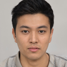 Neutral asian young-adult male with short  black hair and brown eyes