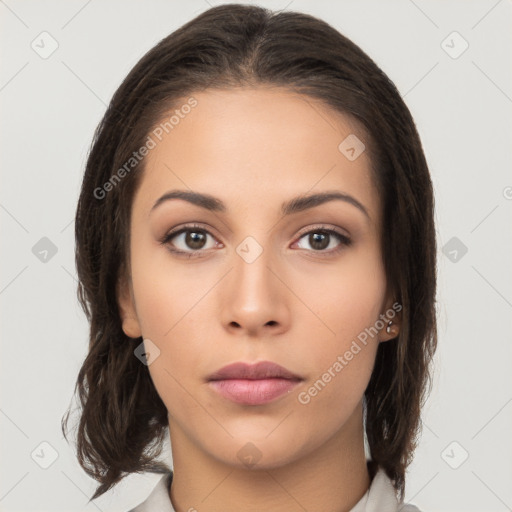 Neutral white young-adult female with medium  brown hair and brown eyes