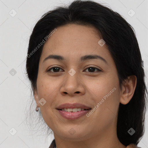 Joyful asian adult female with medium  brown hair and brown eyes