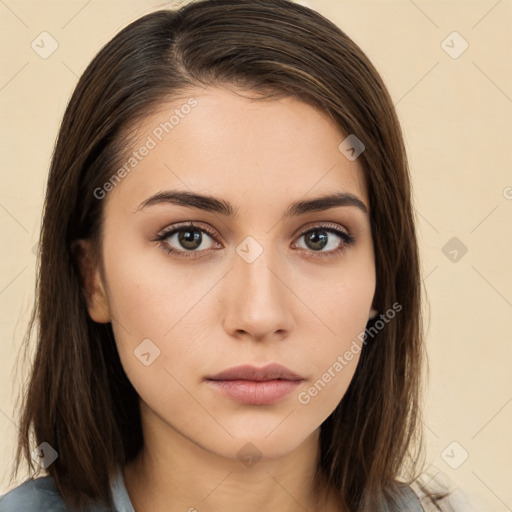 Neutral white young-adult female with long  brown hair and brown eyes