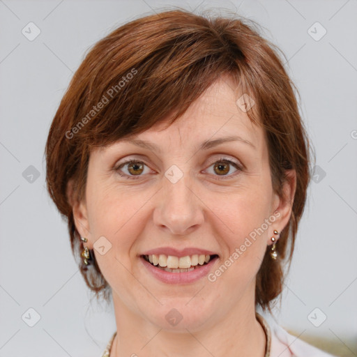 Joyful white adult female with medium  brown hair and grey eyes