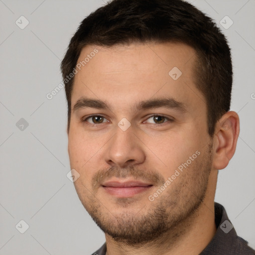 Joyful white young-adult male with short  brown hair and brown eyes