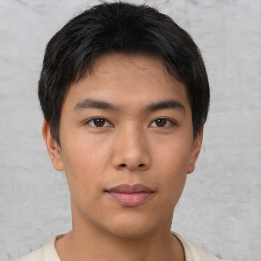 Neutral asian young-adult male with short  brown hair and brown eyes