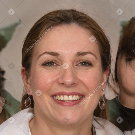 Joyful white adult female with medium  brown hair and blue eyes