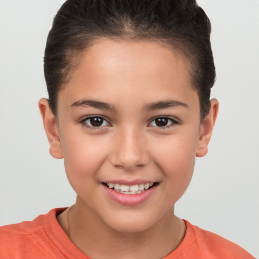 Joyful white child female with short  brown hair and brown eyes