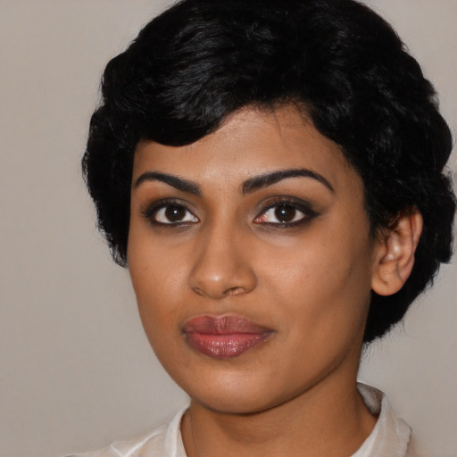 Joyful asian young-adult female with short  black hair and brown eyes