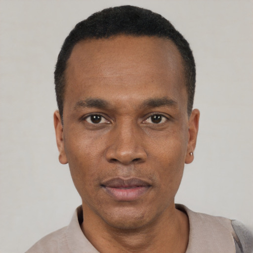 Neutral black adult male with short  black hair and brown eyes