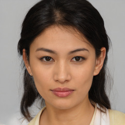 Neutral asian young-adult female with medium  brown hair and brown eyes