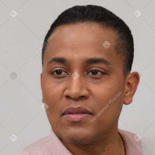 Neutral black young-adult male with short  black hair and brown eyes