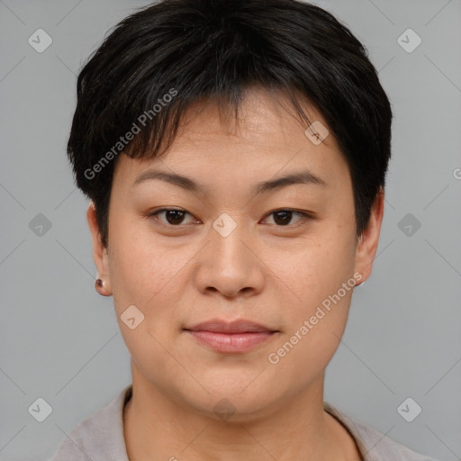 Joyful asian young-adult female with short  brown hair and brown eyes