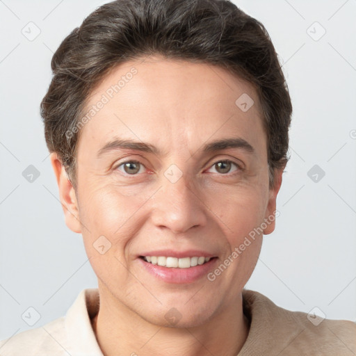 Joyful white adult male with short  brown hair and grey eyes