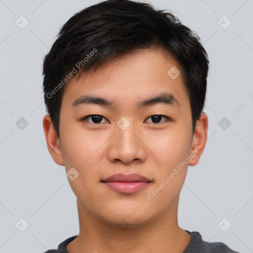 Joyful asian young-adult male with short  brown hair and brown eyes