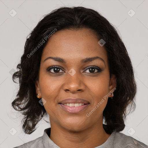 Joyful black young-adult female with medium  black hair and brown eyes