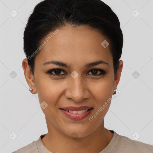 Joyful latino young-adult female with short  brown hair and brown eyes