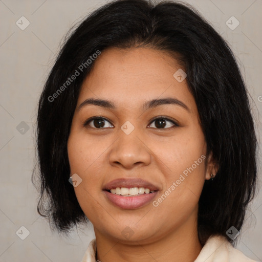 Joyful latino young-adult female with medium  brown hair and brown eyes