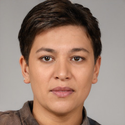 Joyful white young-adult female with short  brown hair and brown eyes