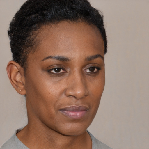 Neutral black young-adult female with short  brown hair and brown eyes