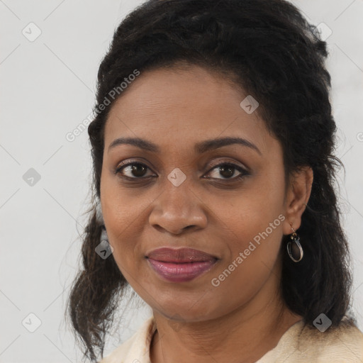 Joyful black young-adult female with medium  brown hair and brown eyes