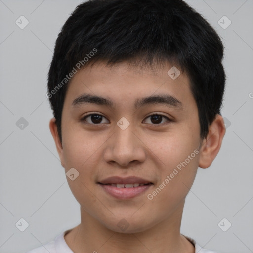 Joyful asian young-adult male with short  brown hair and brown eyes