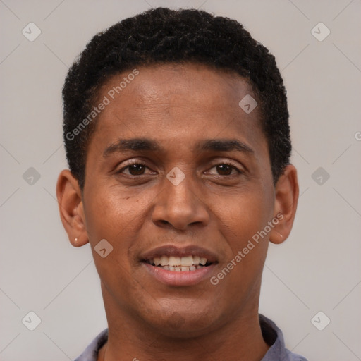 Joyful black young-adult male with short  brown hair and brown eyes