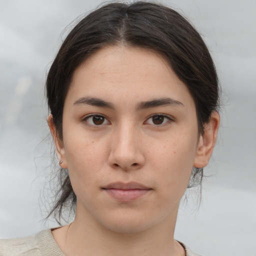 Neutral asian young-adult female with medium  brown hair and brown eyes