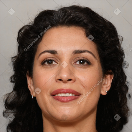 Joyful white adult female with long  brown hair and brown eyes