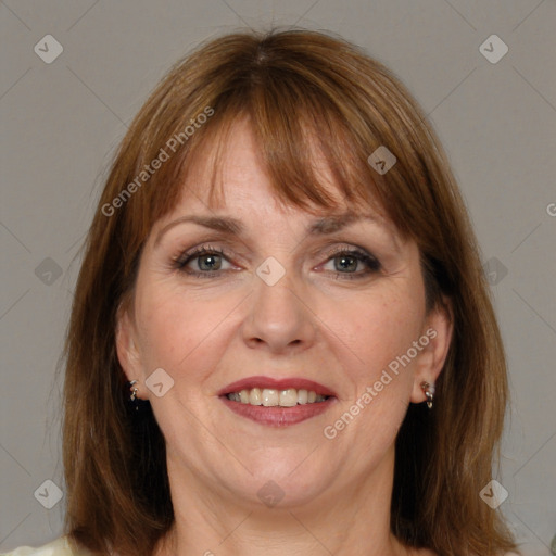 Joyful white adult female with medium  brown hair and grey eyes