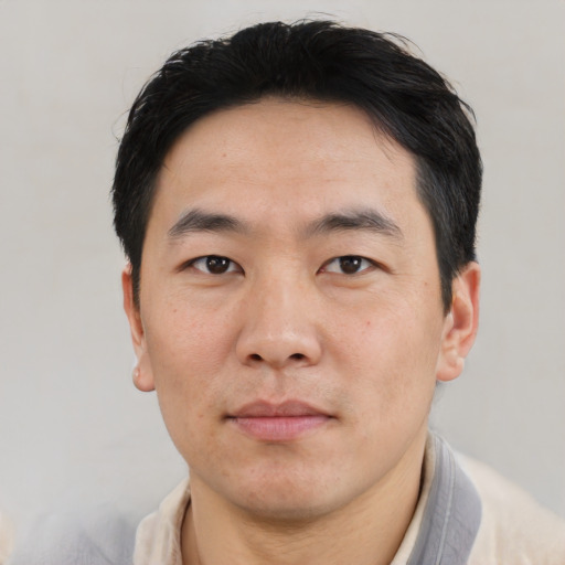 Neutral asian young-adult male with short  black hair and brown eyes