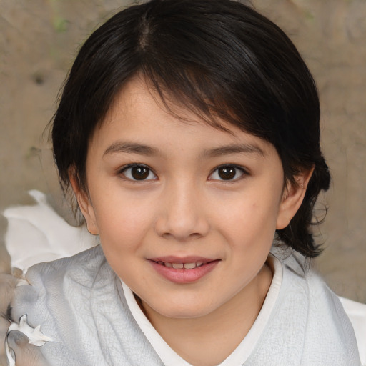 Joyful white child female with medium  brown hair and brown eyes