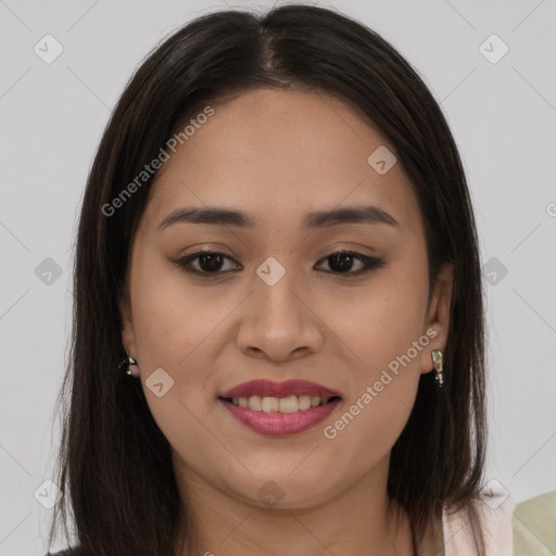 Joyful latino young-adult female with long  brown hair and brown eyes