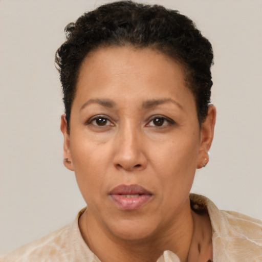 Neutral black adult female with short  brown hair and brown eyes
