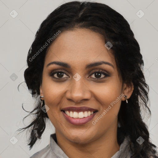 Joyful black young-adult female with medium  brown hair and brown eyes