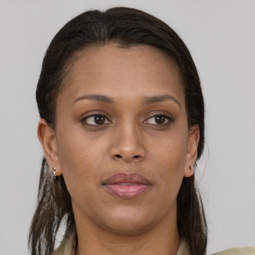 Joyful white young-adult female with medium  brown hair and brown eyes