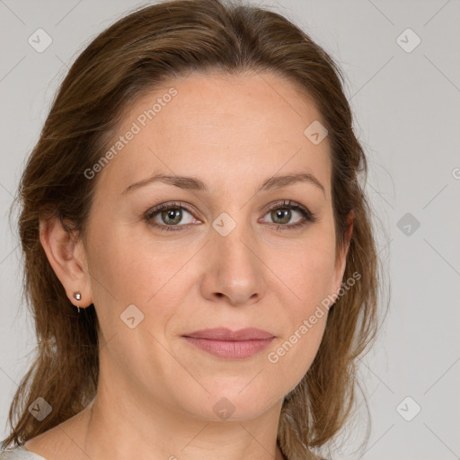 Joyful white young-adult female with medium  brown hair and green eyes