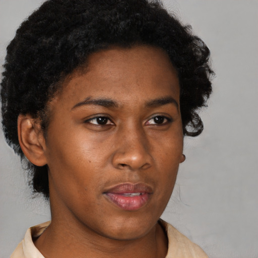 Neutral black young-adult female with short  black hair and brown eyes
