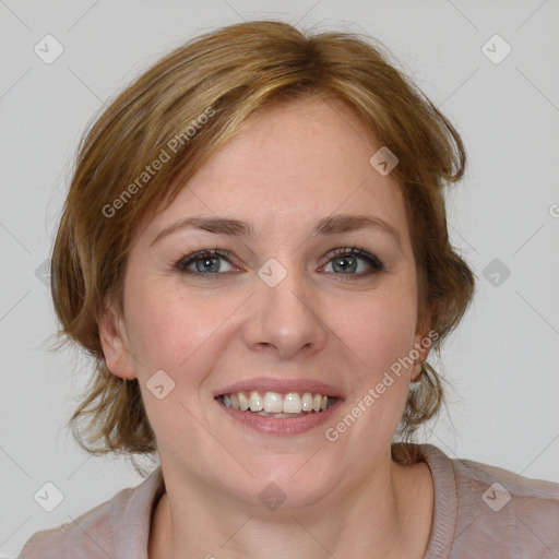 Joyful white young-adult female with medium  brown hair and blue eyes