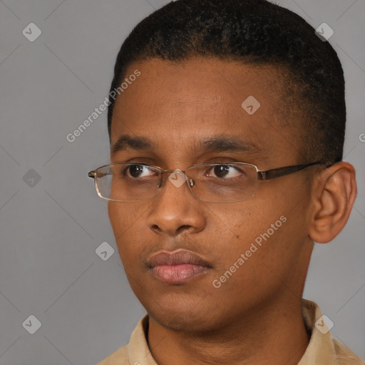 Neutral latino young-adult male with short  black hair and brown eyes