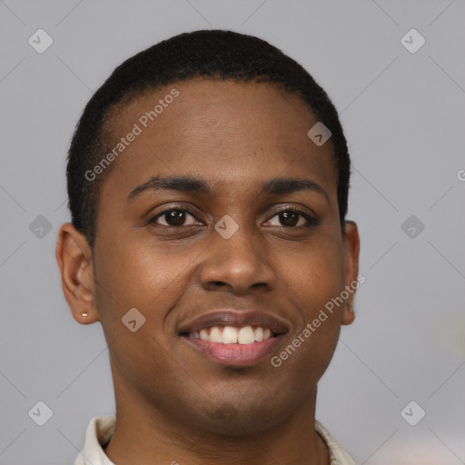 Joyful black young-adult male with short  brown hair and brown eyes