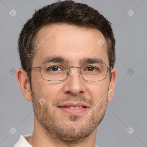 Joyful white adult male with short  brown hair and brown eyes