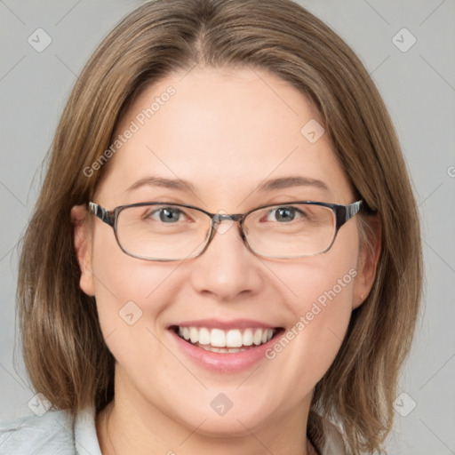 Joyful white young-adult female with medium  brown hair and blue eyes