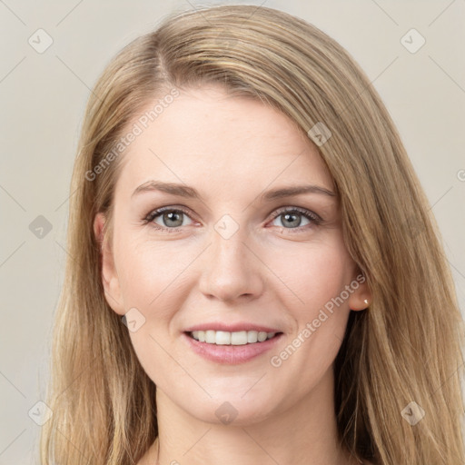 Joyful white young-adult female with long  brown hair and grey eyes