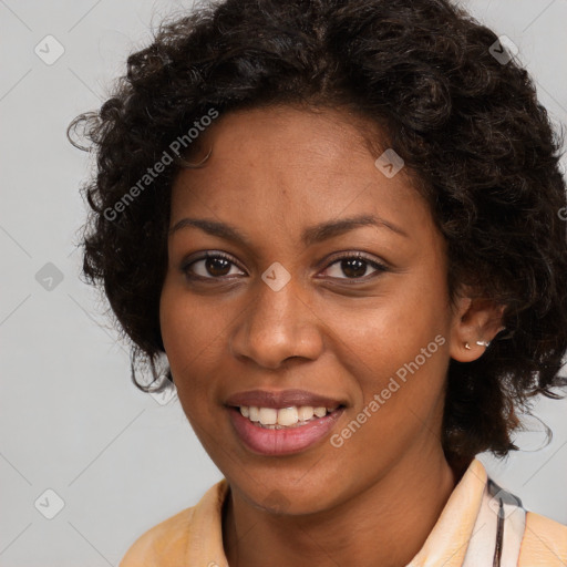 Joyful black young-adult female with long  brown hair and brown eyes