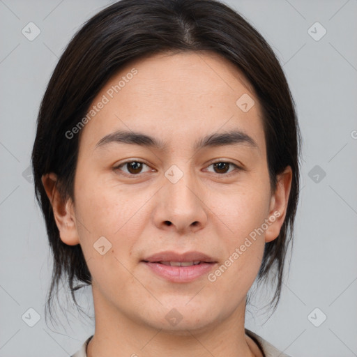 Joyful asian young-adult female with medium  brown hair and brown eyes